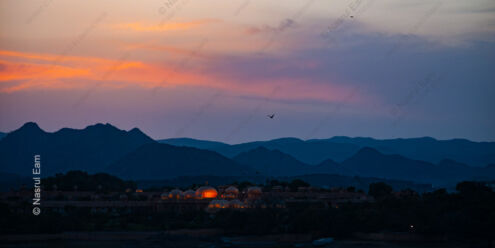 Golden Domes Beneath Twilight Peaks