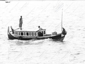 Figure on Deck, River Voyage - Figure on Deck River Voyage, Nasrul Eam print, minimalist black and white photography, fine art photography, limited edition art print, monochrome river photograph