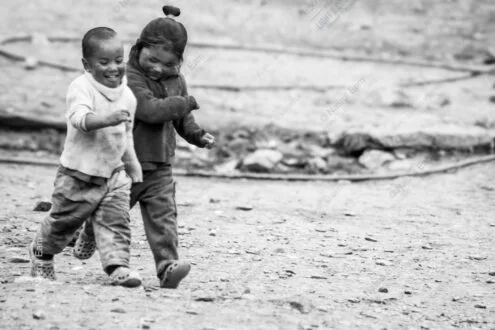 Two Figures in Motion on Dusty Ground
