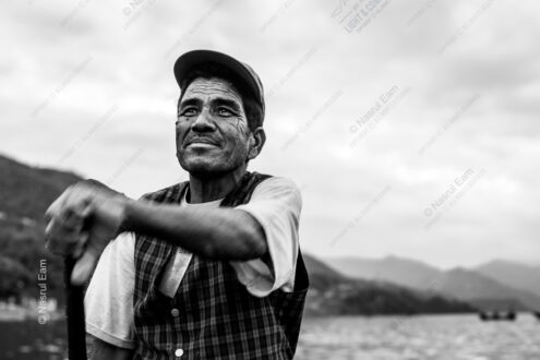 Man with Oar, Looking Skyward