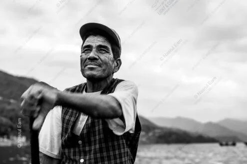 Man with Oar, Looking Skyward