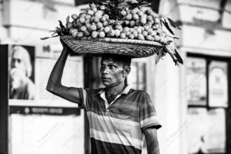 Lychee Basket Above the Head - Lychee Basket Above the Head, Nasrul Eam fine art print, monochromatic street photography print, limited edition art prints, Certificate of Authenticity, buy black and white street photography art