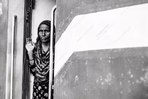 Woman at the Train Doorway