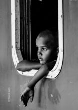Child at the Rounded Carriage Window - Child at the Rounded Carriage Window, Nasrul Eam, limited edition print, fine art portraiture, monochrome photography, visual storytelling