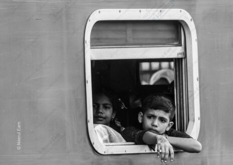 Pensive Gaze from a Train Window