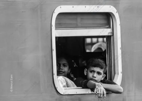 Pensive Gaze from a Train Window