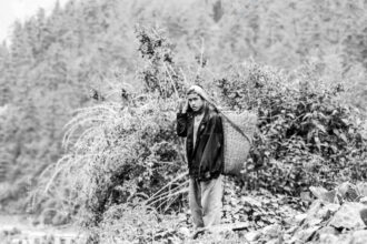 Young Carrier on the Mountain Path - Young Carrier on the Mountain Path, Nasrul Eam fine art print, black and white photography, limited edition prints, mountain landscape photography, visual storytelling art