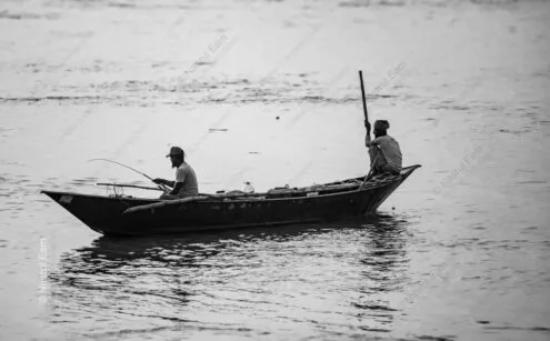 Two Figures, One Rod, River's Flow