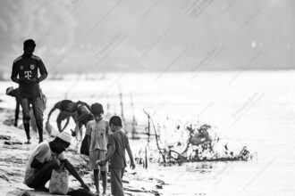 Shoreline Gathering, Children and the River - Shoreline Gathering Children and the River, Nasrul Eam fine art print, documentary photography print, visual storytelling photography