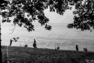 Cast Net Beneath Overhanging Branches - Cast Net photography, monochrome fine art print, Nasrul Eam art, fine art nature photography, limited edition print, visual storytelling