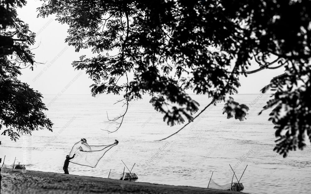 Fisherman's Net Against the Water - fisherman's net, fisherman casting net, black and white photography, Nasrul Eam photography, fine art print, limited edition