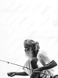 Man with Slender Rod and Knotted Headwrap