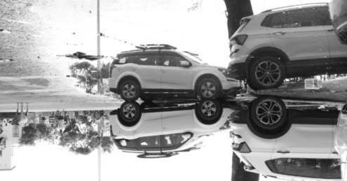 Street Water Reflect as Mirror by Karthick Saravanan - Street Photography, Reflective Photography, Photo of the Day, Art Photography, Photography Education