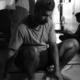 The Man Talking with Newspaper by Karthick Saravanan