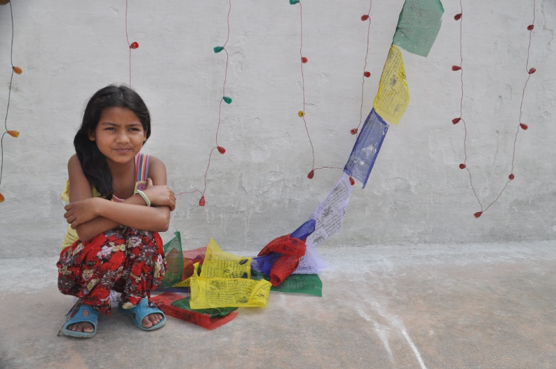 Pilgrim Girl & Prayer Flags by Ryszard Wierzbicki