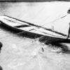 Two Fishermen Hauling the Net