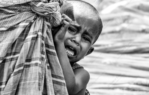 A Child's Cry Against Woven Cloth