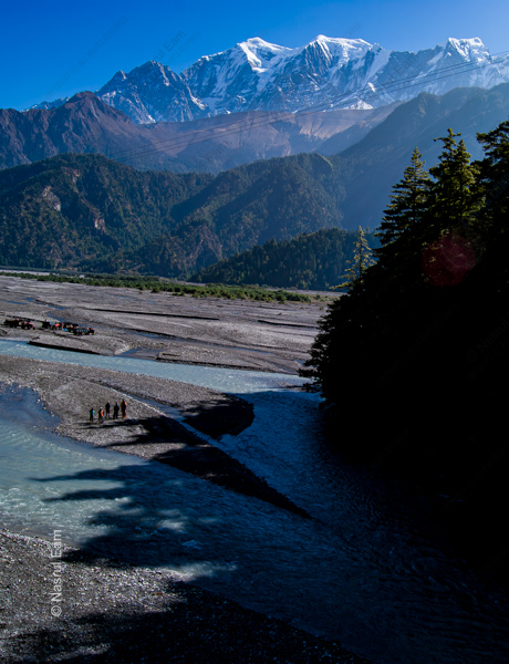 Figures by the Glacial River, Himalayan Foothills