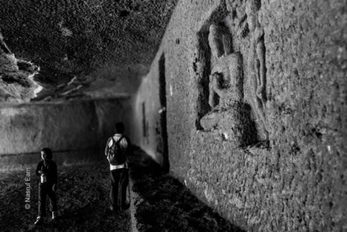 Two Visitors in the Rock-Cut Temple