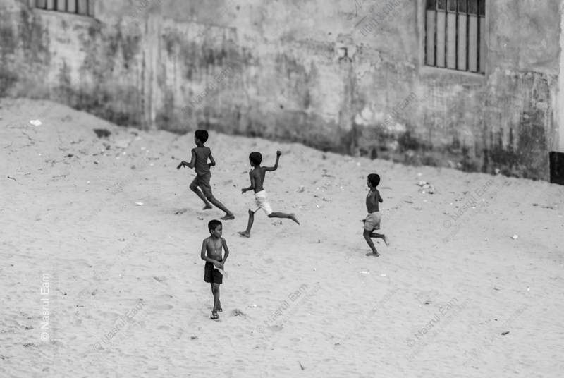 Boys Running on Sand