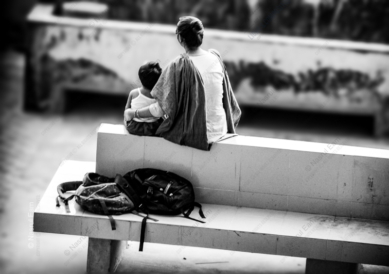 Shared Silence on a Concrete Bench