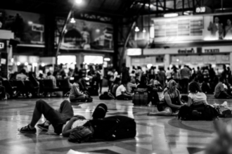 Travelers Resting on the Station Floor - Fine Art Photography Print, Limited Edition Photography, Black and White Photography, Human Emotion Photography,  Contemporary Art Photography