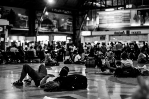 Travelers Resting on the Station Floor - Fine Art Photography Print, Limited Edition Photography, Black and White Photography, Human Emotion Photography,  Contemporary Art Photography