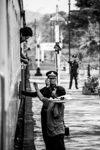 A Vendor's Offering at the Trainside - Fine Art Photography Print, Limited Edition Photography, Museum-Quality Photography, Black and White Photography, Art Photography for Collectors