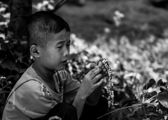 A Young Boy with a String of Beads - Fine Art Photography Print, Limited Edition Photography, Art Photography for Sale, Collector Photography, Museum-Quality Photography