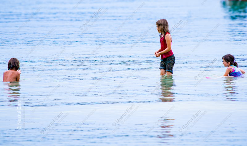 Three Figures in the Shallows