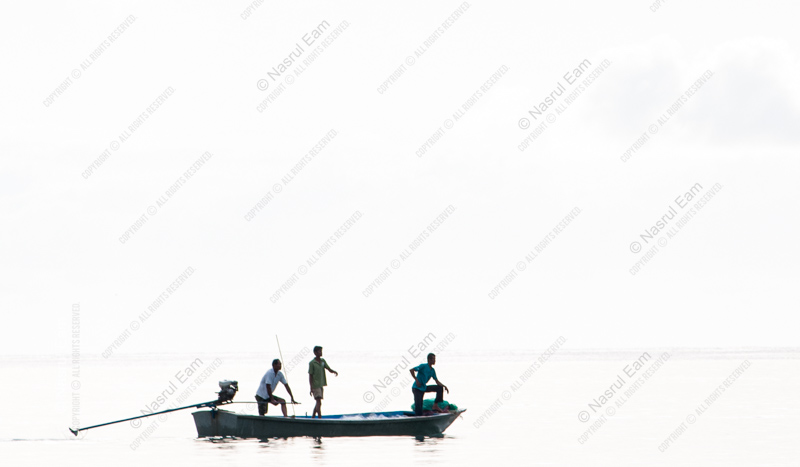 Three Men on a Sunlit Sea