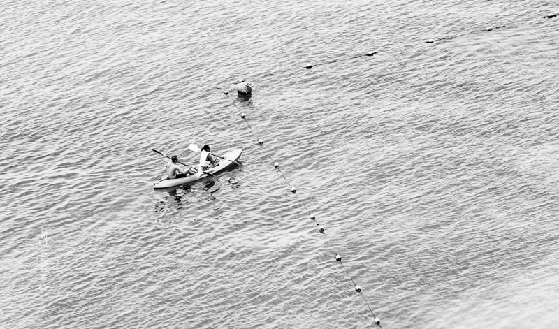 Two Paddlers and the Buoy Line