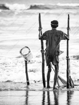 The Solitary Figure of a Fisherman