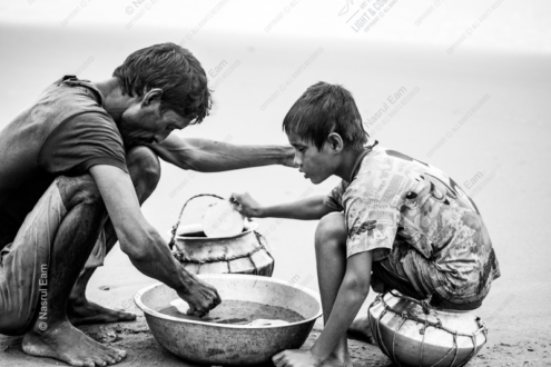Collecting Fish - Fine Art Photography Print, Limited Edition Photography, Monochrome Photography,  Documentary Photography, Nasrul Eam
