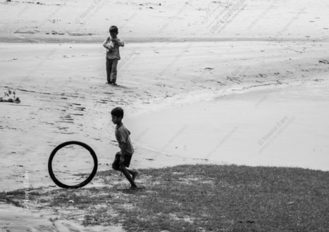 The Boy with the Rolling Tire - Fine Art Photography Print, Limited Edition Photography, Giclée Print, Black and White Photography, Art Photography for Sale