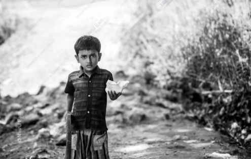 Young Boy Holding a Paper Parcel