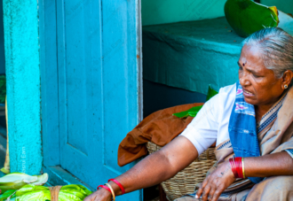 The Vegetable Seller and the Blue Wall - Fine Art Photography Print, Limited Edition Photography, Giclée Print, Museum-Quality Photography, Contemporary Art Photography