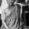 Elderly Woman Seated by a Wooden Cart - Fine Art Photography Print, Limited Edition Print, Black and White Photography, Portrait Photography, Giclée Print