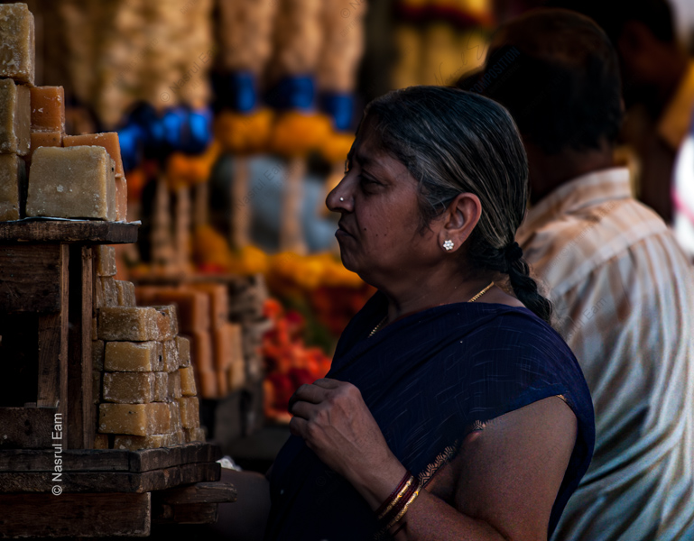 Woman Before the Jaggery Blocks