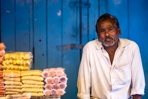 Vendor at the Blue Wall - Fine Art Photography Print, Limited Edition Photography, Photography Art Sale,  Documentary Photography,  Nasrul Eam
