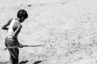 Boy with a Stick in the Dust - Fine Art Photography Print, Limited Edition Photography, Giclée Print, Black and White Photography, Art Photography for Sale