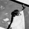 A Woman's Gesture Toward the Shadow