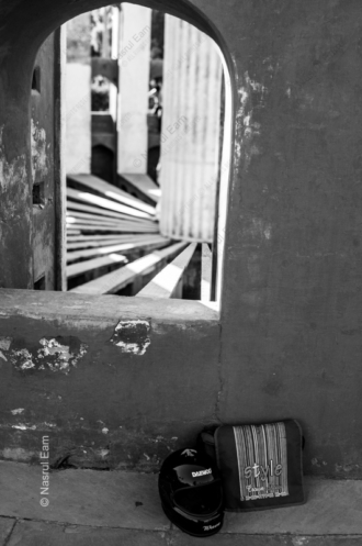 A Rider's Helmet Below the Observatory Arch