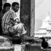 Two Men on a Stone Parapet
