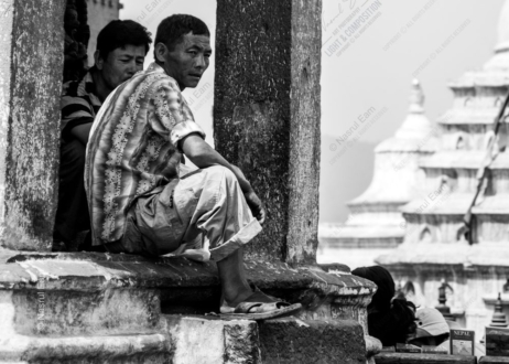 Two Men on a Stone Parapet