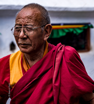 Elderly Monk in Crimson Robes