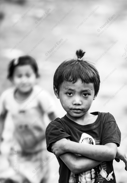 Boy with Crossed Arms