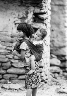 A Young Girl Carrying a Toddler - Fine Art Photography Print, Limited Edition Photography, Monochrome Photography, Art Photography Print, Fine Art Print