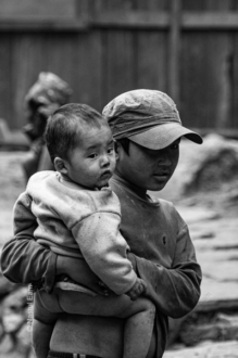 In the Arms of an Older Sibling - Fine Art Photography Print, Limited Edition Photography,  Monochrome Photography, Sibling Portrait,  Art Photography for Sale