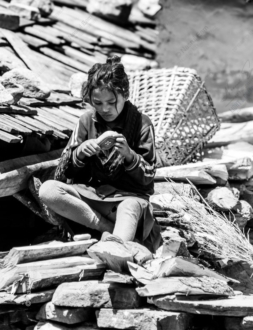A Girl's Quiet Work on a Stone Wall